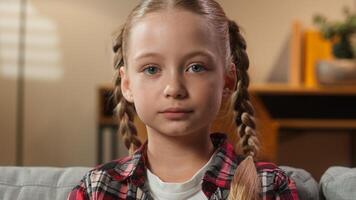 Portrait Caucasian little teen girl daughter child kid European teenager schoolgirl at home indoors calm serious positive looking at camera portrait childcare health custody pediatric health family photo
