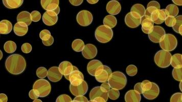 Abstract Animation Glowing Yellow and Orange Patterned Circles Floating on Black Background with Bokeh Effect, Abstract Bubbles Orange and Yellow Circles on Black, Liquid Movement Organic Yellow video
