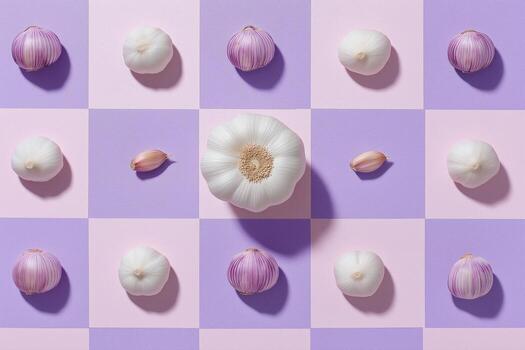 single garlic bulb and cloves arranged in geometric pattern on pastel background. photo