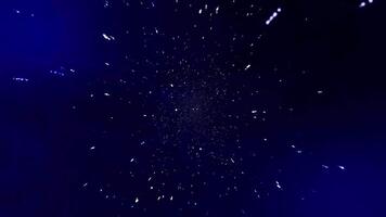 A dark blue background with stars and light video