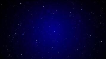 A dark blue background with stars and snow video