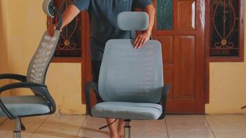 Adjusting a Modern Office Chair in a Home Office video