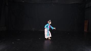 Dancer in Traditional Attire on Stage video
