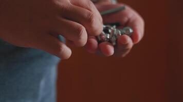 Person Holding Bolt and Metal Fasteners video