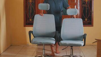 Assembling Modern Office Chairs in a Bright Room video
