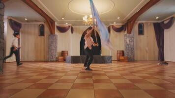 Vibrant Dance Performance in Elegant Hall video