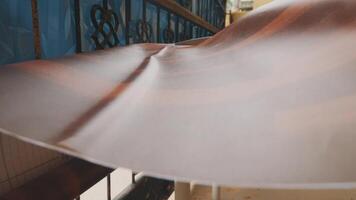 Curved Sheet of Material with Decorative Background video