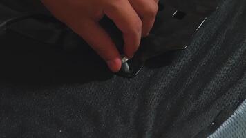 Hands Assembling Metal Component with Wrench video