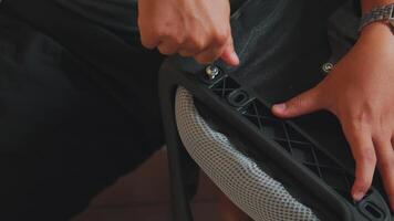 Close-Up of Hands Assembling Furniture Indoors video
