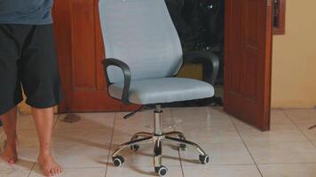 Casual Indoor Scene with Person and Swivel Chair video
