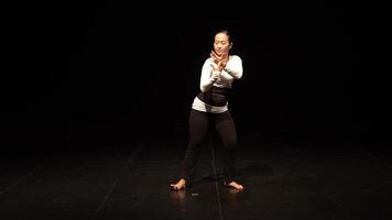 Elegant Dancer Performing on Stage video