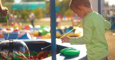 Child Playing with Water Toys at Outdoor Playground video