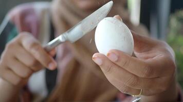 Enjoying a soft-boiled egg at the breakfast table video