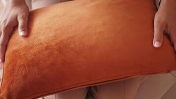 closeup of hands on a pillow video