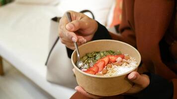 Enjoying a healthy bowl of fresh fruits and nuts video