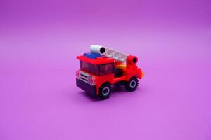 Colorful Fire Truck Toy Made from Plastic Bricks photo