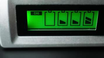 Close-up View of Digital Battery Charging Indicator Showing Progress on Energy Storage Device video