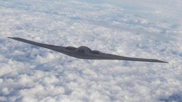 A stealth fighter flying in the sky above clouds video