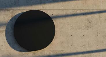 High-resolution black circular billboard on textured concrete wall with soft shadows, ideal for design mockups. photo
