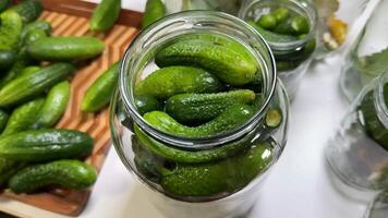A close up of fresh cucumbers being prepared for pickling, highlighting home canning, fermentation, and preserving traditions video