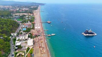 Turkey, Antalya 09.27.2024 Drone Over luxury resort beach with loungers and sea video