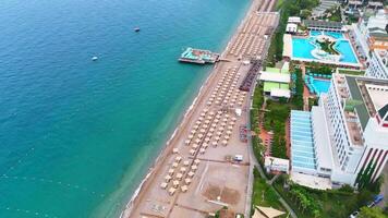 Turkey, Antalya 09.27.2024 Luxury beach resort with pools and forested cliffs video