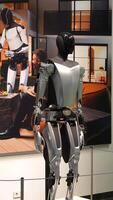Tesla Bot humanoid robot on showroom display Berlin Germany May 28 2025 video