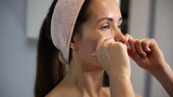 Side view cheek lifting massage with knuckles video