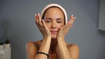 Face cupping with palms during facial massage routine video