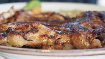 Grilled chicken served with fresh vegetables and sauce video