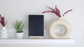 Modern shelf with plants and stylish vase video