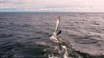 Windsurfing adventure on a breezy ocean day video