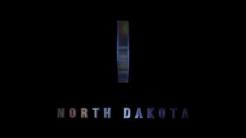 Rotating glass map of north dakota on black background video