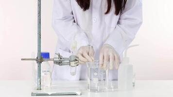 Science experiment demonstrating thermal decomposition process video