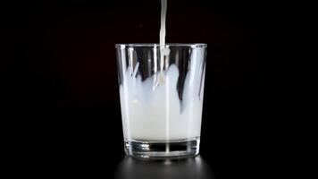 Milk being poured into a glass video
