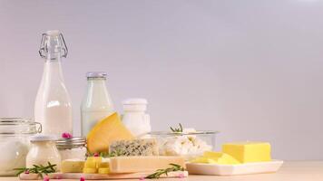 Assorted dairy products on a white background video