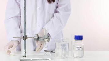 Scientist conduct copper carbonate decomposition experiment video