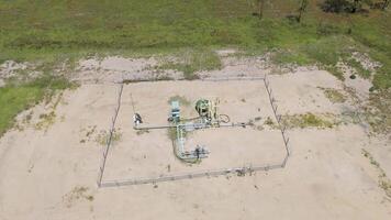 Aerial spin view of gas mining operations video