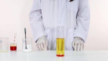 Scientist demonstrates a vibrant lava lamp experiment video