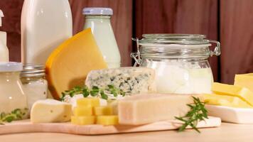 Various dairy item displayed on a wooden surface video