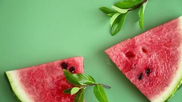 Watermelon slices with green leaves video