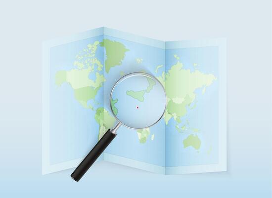 A folded world map with a magnifying lens pointing towards Malta. Map and flag of Italy in loupe.