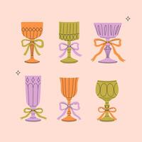 Set of colored crystal glasses with bows. graphics. vector