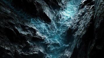 Dark Cave Flows with Turquoise Water, Creating Mystical Scene photo