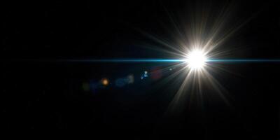 A brilliant starburst effect creating an abstract display of bright beams and light. photo