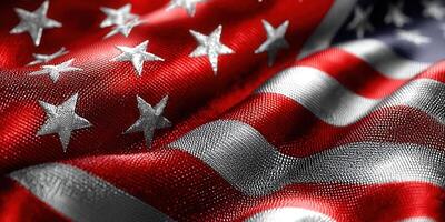 The American flag waves, displaying its stars and stripes in a textured close-up view. photo