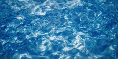 The image showcases a close-up view of clear blue water with gentle ripples, creating a sense of peace and tranquility. photo