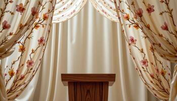 close up view of a podium standing beneath translucent fabric canopies embroidered with pressed blossoms and soft gold thread. photo