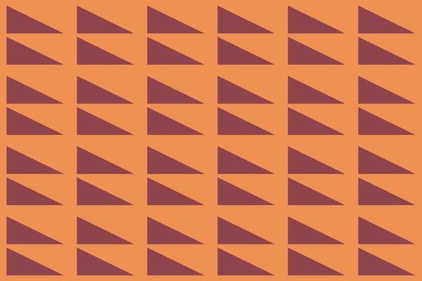 A pattern of triangles on an orange background