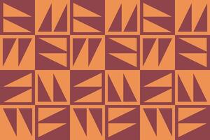 A pattern with orange and brown triangles vector